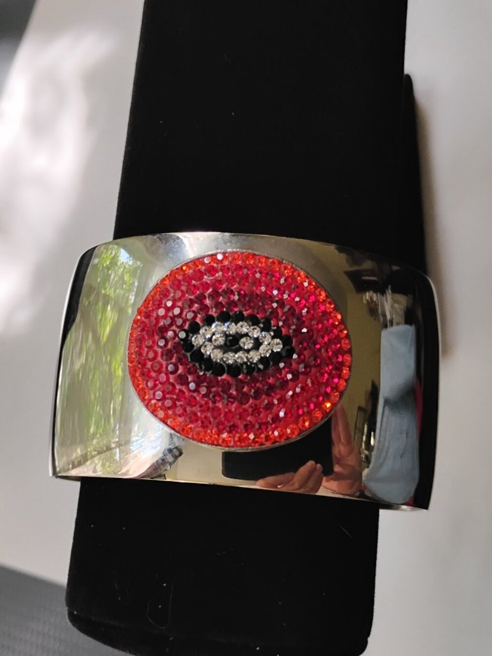 Shiny Silvertone Cuff Bangle with Red Beaded Eye